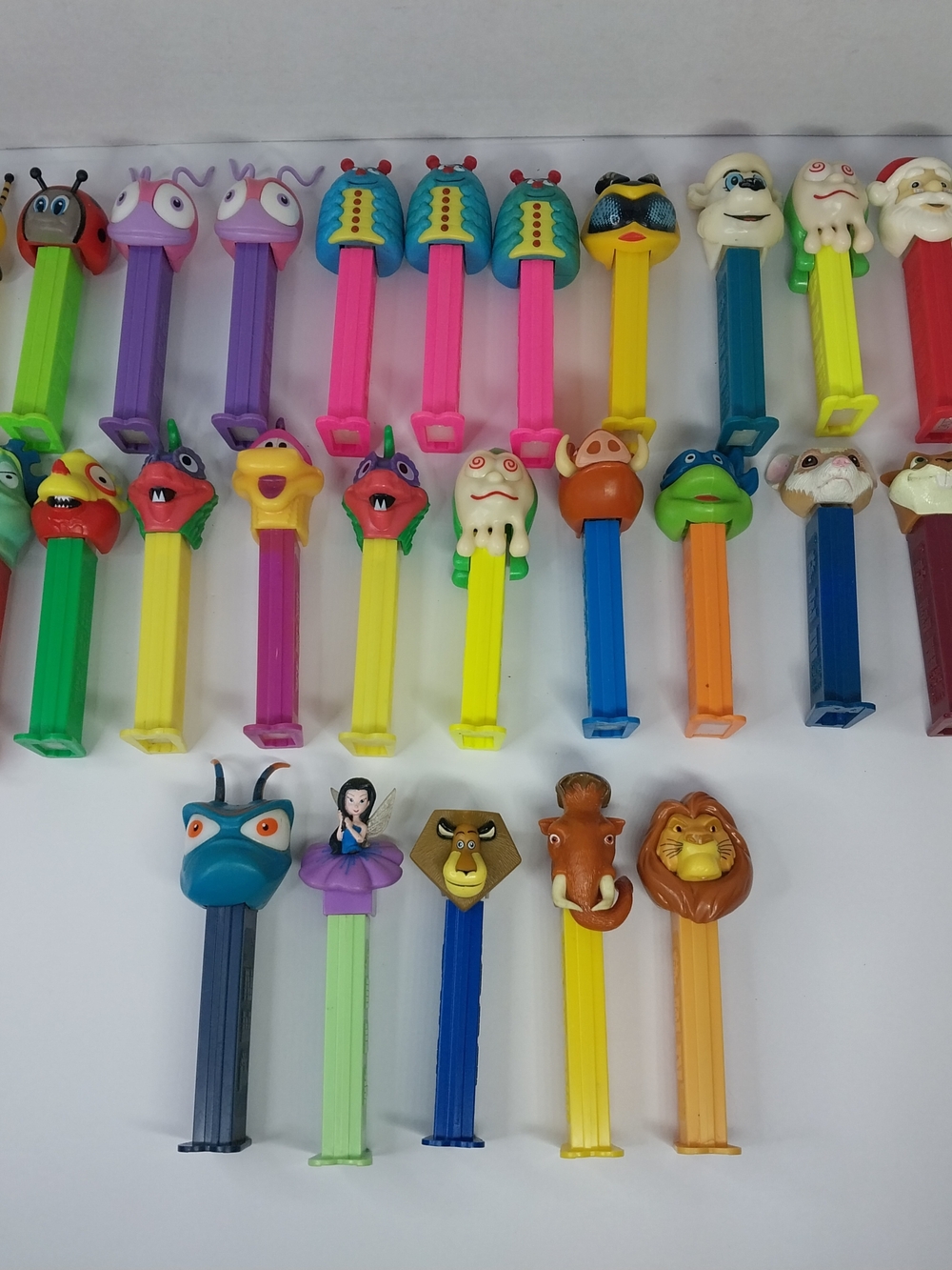 Vintage Pez Dispenser w/ Feet Lot Of 27 Early 2000s Disney Holiday Bugs Animals